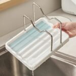 Sorty Multi-Functional Kitchen Lid and Spoon Rest on a countertop